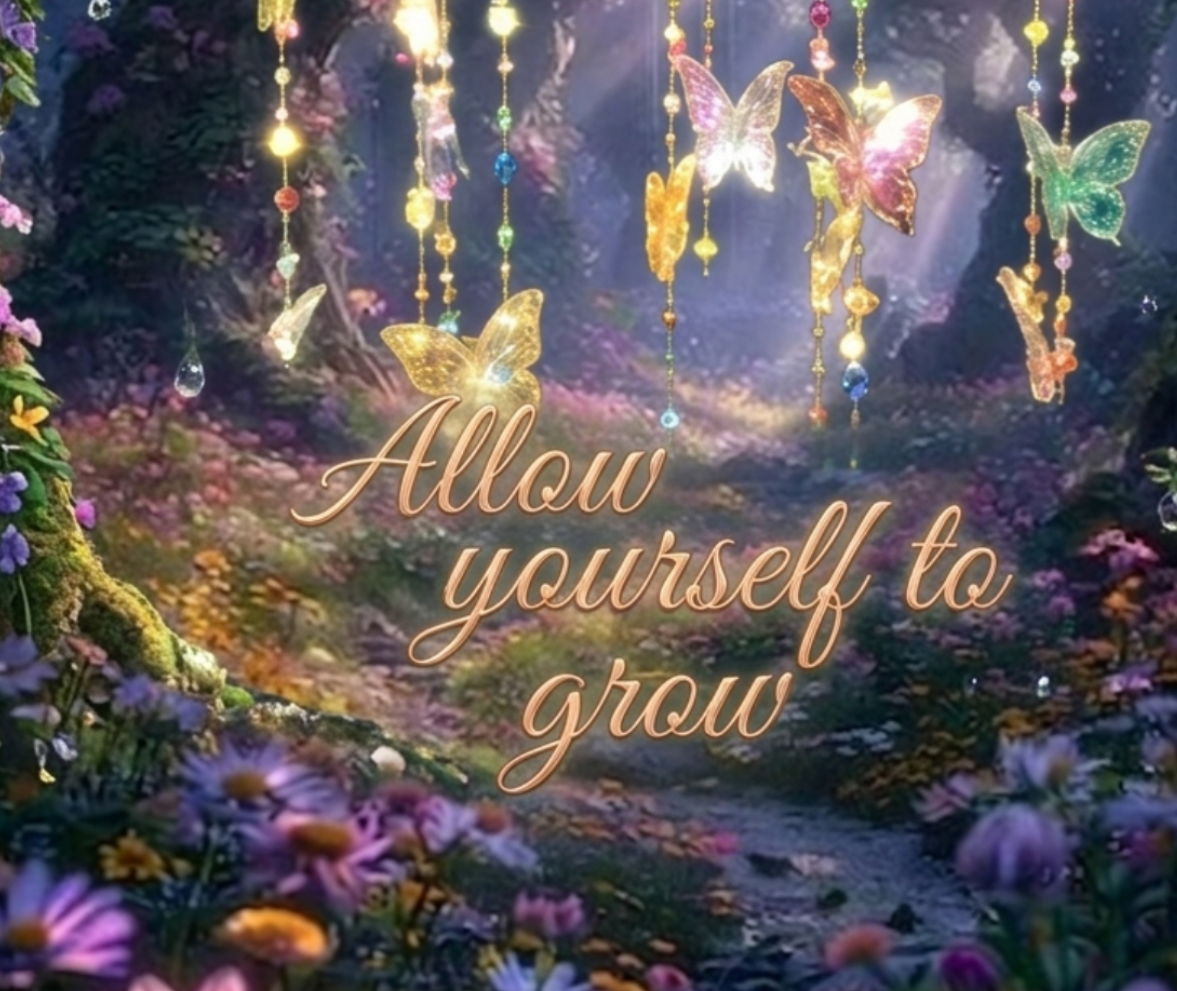 Butterfly decorations hanging above a garden with the quote 'Allow yourself to grow'.